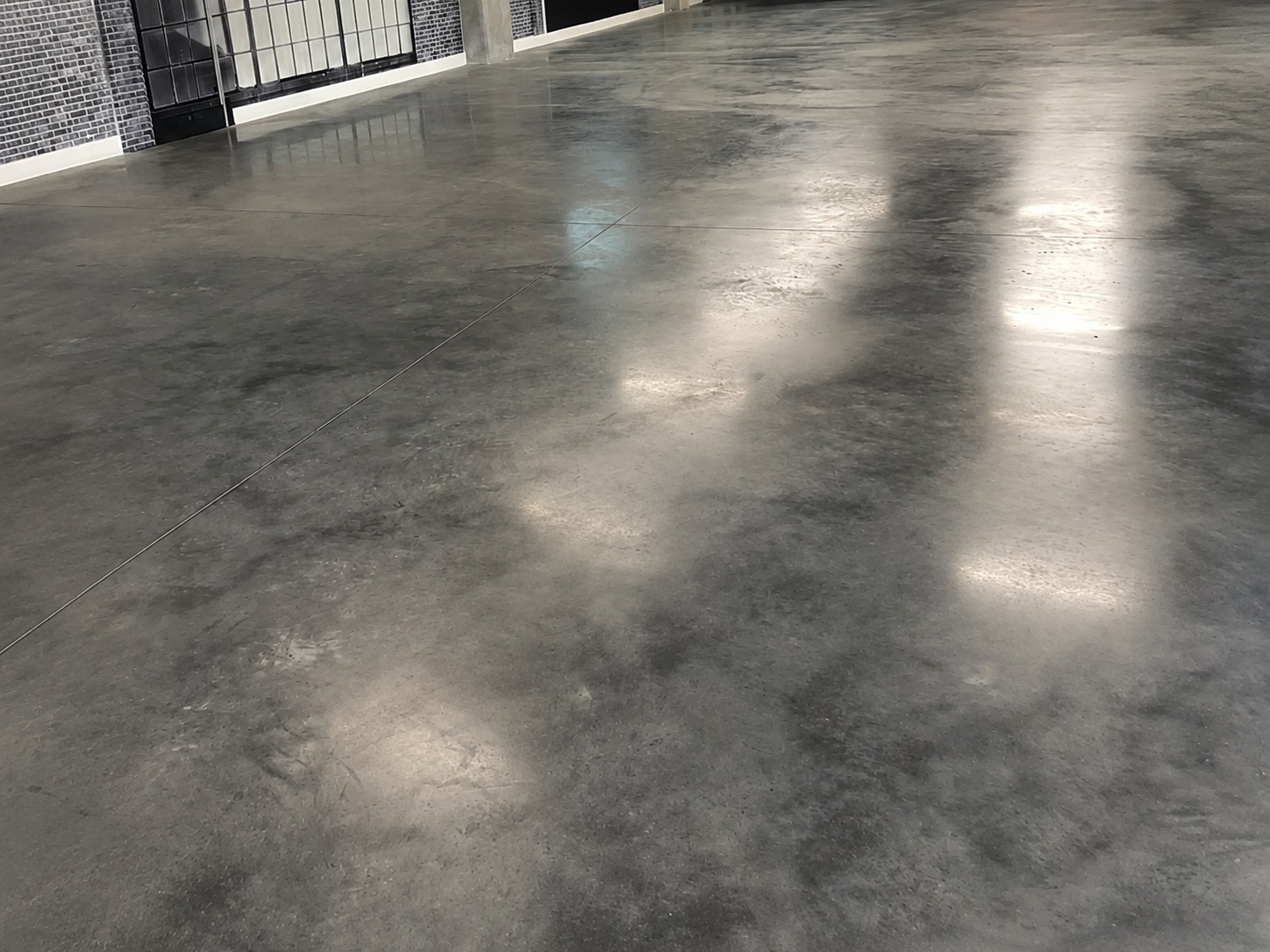 A finished, durable residential concrete driveway