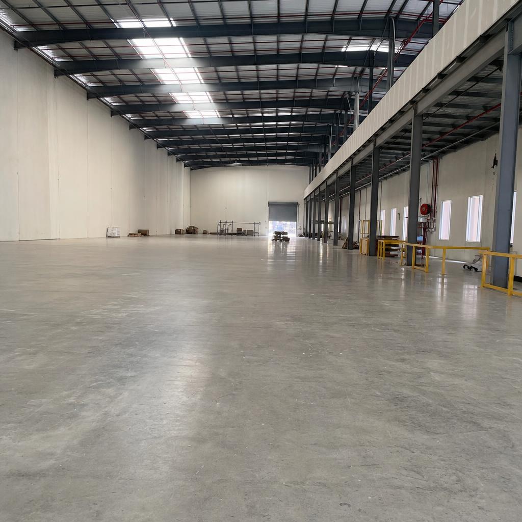 Wide interior warehouse with a polished concrete floor